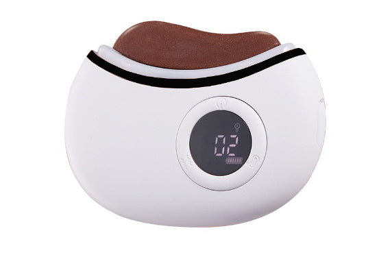 Electric Gua Sha massager with heat and vibration therapy