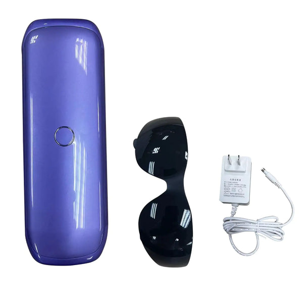 Purple electronic device, black eye mask, and white power adapter with cable on a white background